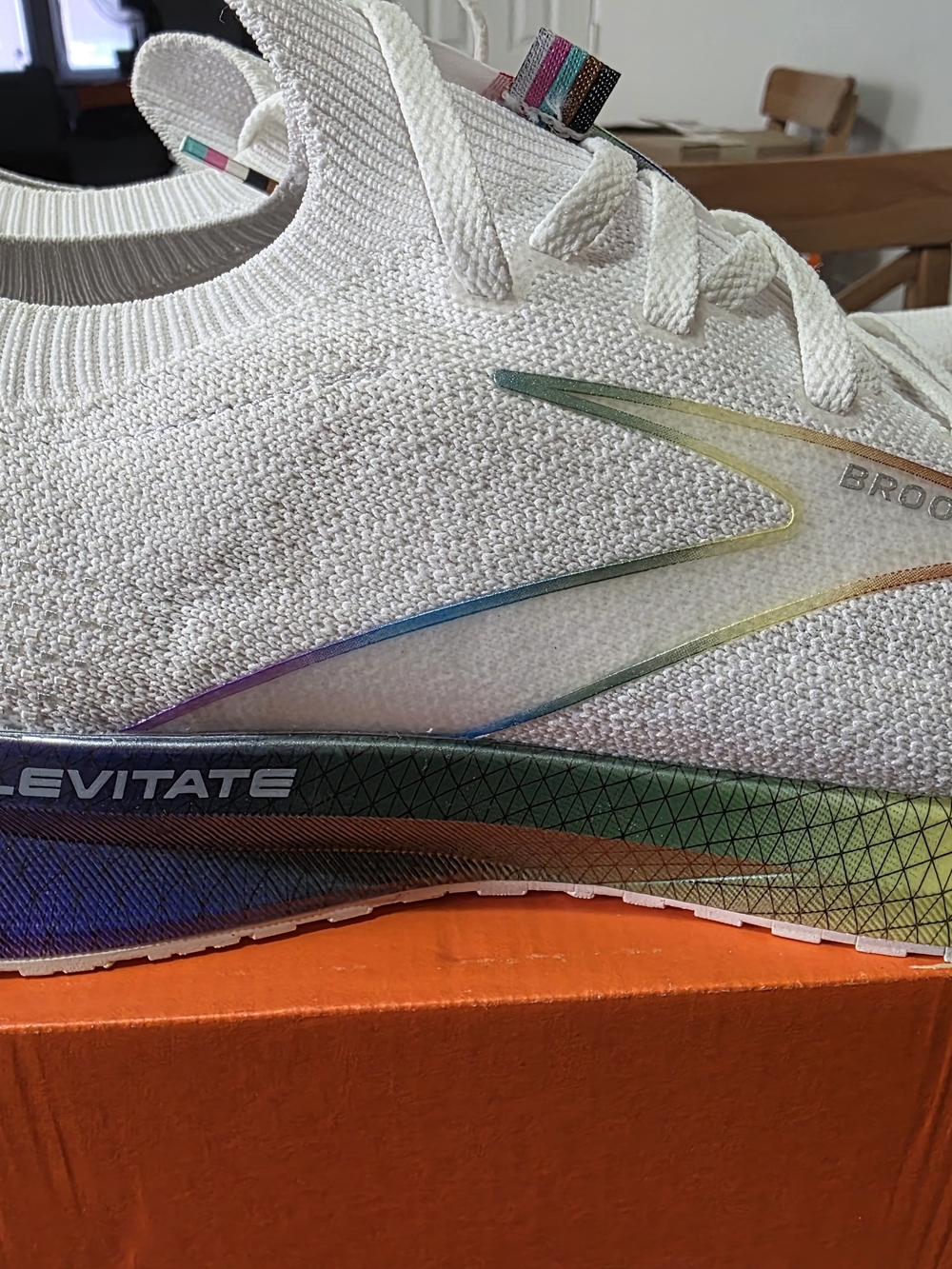 Nike Men's White Running Shoes with Rainbow Accents